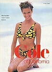 Cole of California sitting on the beach - U.S. Cosmo 12-87